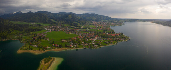 Aerial view of the city Bad Wiessee in Germany, Bavaria on a cloudy rainy spring day during the coronavirus lockdown.
