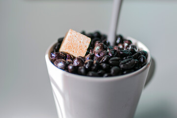 coffee beans in a cup