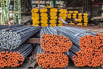 Steel rods or bars used to reinforce concrete.
