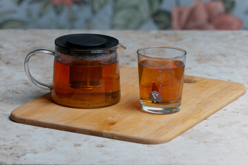 Holiday cookies and tea. Smiling cookies. Gingerbread man, tree and smiley. Gingerbread christmas party
