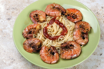 pasta with shrimp. traditional italian dish with shrimp. Home kitchen.