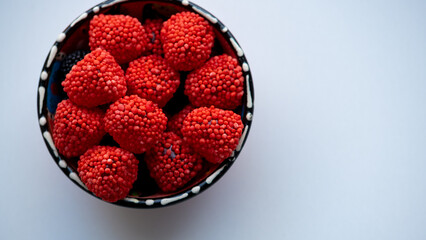 Marmalade sweets for children. Raspberries from marmalade and jam. delicious fruit treats