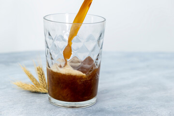 Traditional Russian drink kvass on wooden table