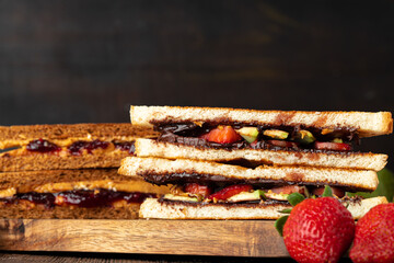 Sandwich toast with chocolate paste and cut strawberry
