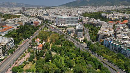 Aerial drone photo of Athens Metropolitan dense populated area in Vasilisis Sofias and Vasileos Konstantinou avenues, Attica, Greece