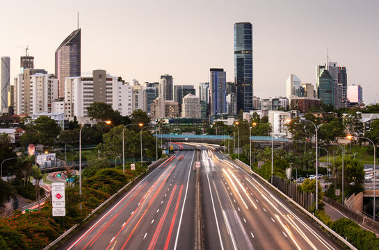 Traffic Streaks and Brisbane City at Sunset