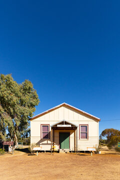 front view of old Bonnie Rock hall with big blue sky