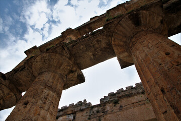 Archaeological excavations of Pestum, Temple of Hera, Italy. Bottom view of the ancient Doric columns