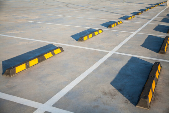 Long shadows in empty car park