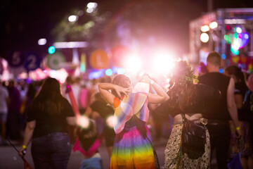 Girl dressed as fairy out at a dress up event at night