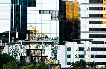 Reflections and geometric patterns in city buildings creating abstract effect