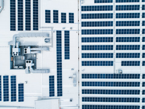 Roof of shopping center covered in solar panels