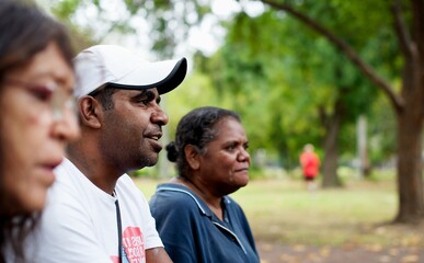 Three Aboriginal Australian People Outdoors in Profile