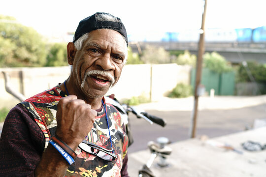 Aboriginal Man with Train in Background