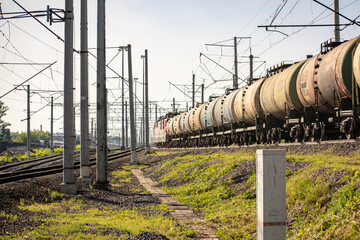 Transportation of crude oil in barrels by rail.