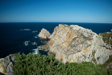 views on the cliff above the lighthouse of luanco