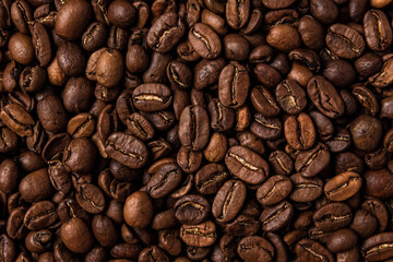 Roasted coffee beans on the table, macro