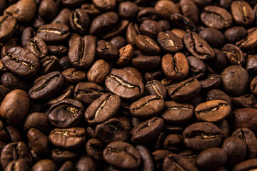 Roasted coffee beans on the table, macro
