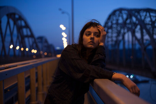portrait of a girl on a bridge
