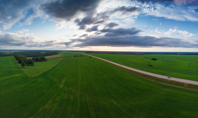 Fototapeta na wymiar Top view of the road in summer evening. View from drone