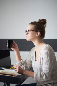 Young woman working on her laptop