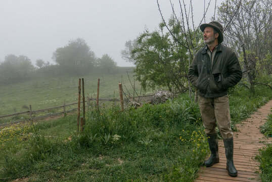Farmer in the mist