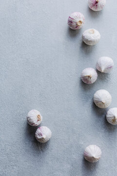 Garlic Still Life on Blue Background