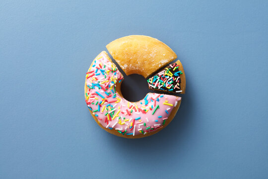 Colorful Pie Chart Made Of Donut Pieces With Various Glaze