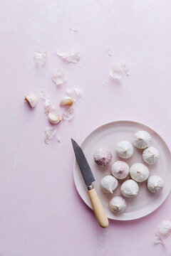 Garlic On Pink Plate