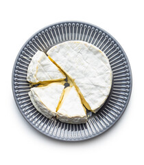 Brie cheese. White soft cheese with white mould.