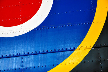 Close up of military aircraft insignia on the side of a plane.