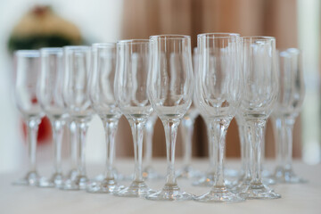 Festive glasses on the festive table during the Banquet. Alcoholic beverage