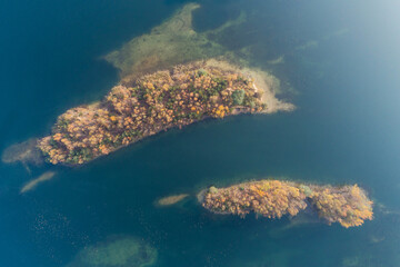 Fototapeta na wymiar Beautiful autumn lake with sand islands like atol. Lake pogoria in Dabrowa Gornicza Poland aerial drone photo