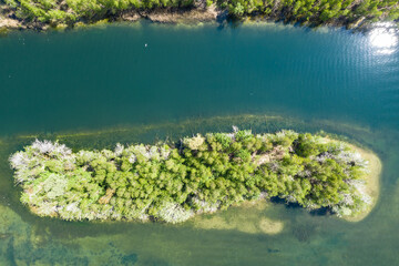 Naklejka na ściany i meble Beautiful lake with sand islands like atol. Lake pogoria in Dabrowa Gornicza Poland aerial drone view