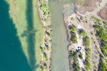 Beautiful lake with sand islands like atol. Lake pogoria in Dabrowa Gornicza Poland aerial drone view