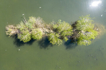 Beautiful lake with sand islands like atol. Lake pogoria in Dabrowa Gornicza Poland aerial drone view