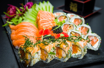 Sushi set (combo). Traditional Japanese cuisine, premium sushi decorated in elegant surroundings.