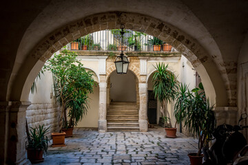 Fototapeta na wymiar A view across a backstreet courtyard in Bari, Italy