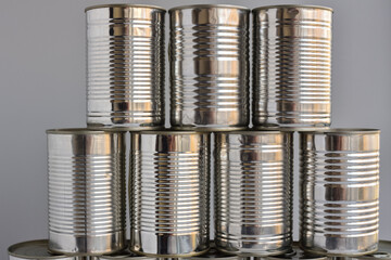 group of aluminium cans with stocks of food for the duration of quarantine and isolation, stacked...