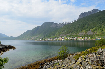 fjord and summer mountain landscape on the island of Senja, northern Norway