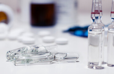 medicine ampoules on the blurred background