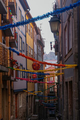Porto, Portugal - "São João" Colorful Decorations in a Small Cobblestone Alley in Sé District