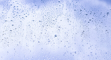 raindrop on the window, blue sky