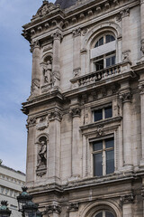 Obraz premium Paris Hotel-de-Ville architectural fragments. Paris Hotel-de-Ville - Neo-Renaissance building of City Hall. Paris's City administration has been located on the same location since 1357. Paris, France.