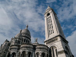 Fototapeta na wymiar Bottom view of the Sacre Coeur Basilica in Paris against the sky.