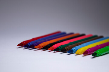 multicolored felt-tip pens on a white background. stationery concept. copy space. isolated. High quality photo