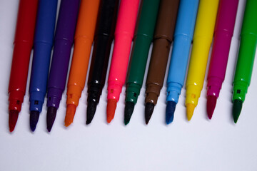 multicolored felt-tip pens on a white background. stationery concept. copy space. isolated. High quality photo