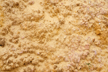 Sand texture of different fractions interspersed with red clay
