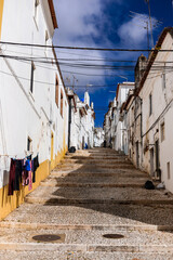 Horizontal photo of a gypsy street in the city of estremoz in the Alentejo.