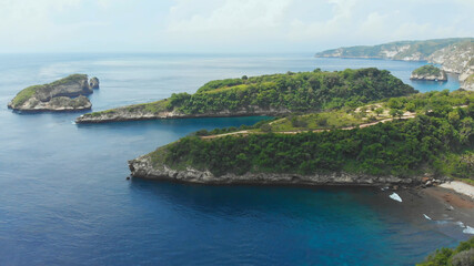 Aerial view of the small island of Nusa Penida Island from the Atuh Rija Lima shrine on Nusa Penida Island near Bali, Indonesia.Nusa Penida island aerial view beach from drone. Travel Indoneesia.